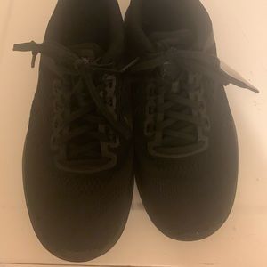 All black size 8 Nike running shoes